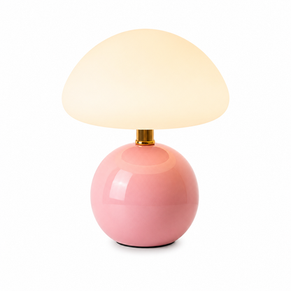 Lampe Champignon Aura LED rechargeable rose sur fond blanc, design contemporain avec abat-jour en forme de champignon, base sphérique brillante, parfaite comme lampe de chevet, lampe de table ou lampe d'ambiance.