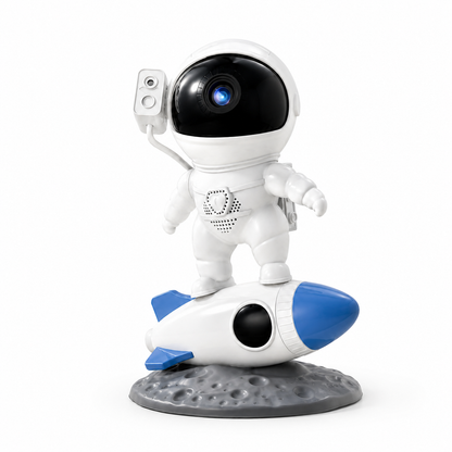 Projecteur astronaute LED en forme d’astronaute sur une fusée lumineuse, présenté sur un fond blanc mettant en valeur son design moderne. Cette veilleuse projecteur de ciel étoilé est idéale pour créer une ambiance apaisante dans une chambre d’enfant tout en ajoutant une touche décorative inspirée de l’espace.