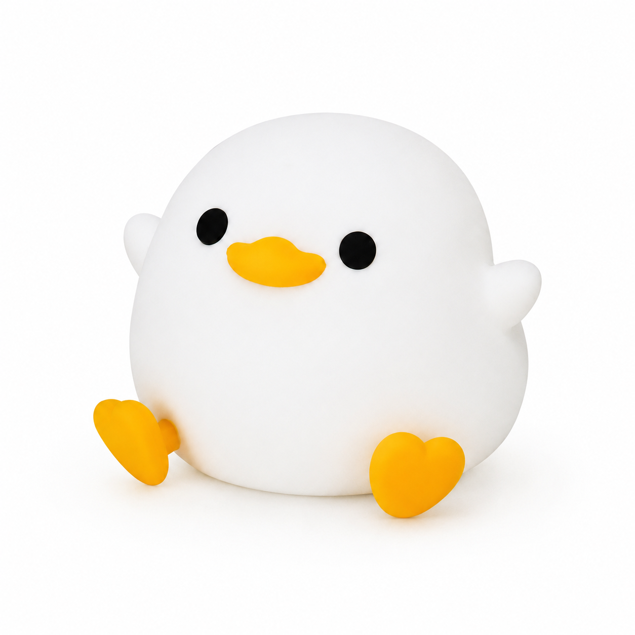 Veilleuse canard en silicone rechargeable diffusant une lumière douce et chaleureuse sur un fond blanc. Son design compact, sa texture souple et son adorable silhouette en font une veilleuse rassurante, idéale pour accompagner les bébés et les jeunes enfants au moment du coucher.