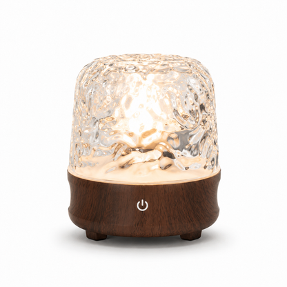 Lampe reflets d’eau décorative Luméa avec lumière LED effet cristal sur fond blanc, idéale pour créer une ambiance zen, chaleureuse et relaxante